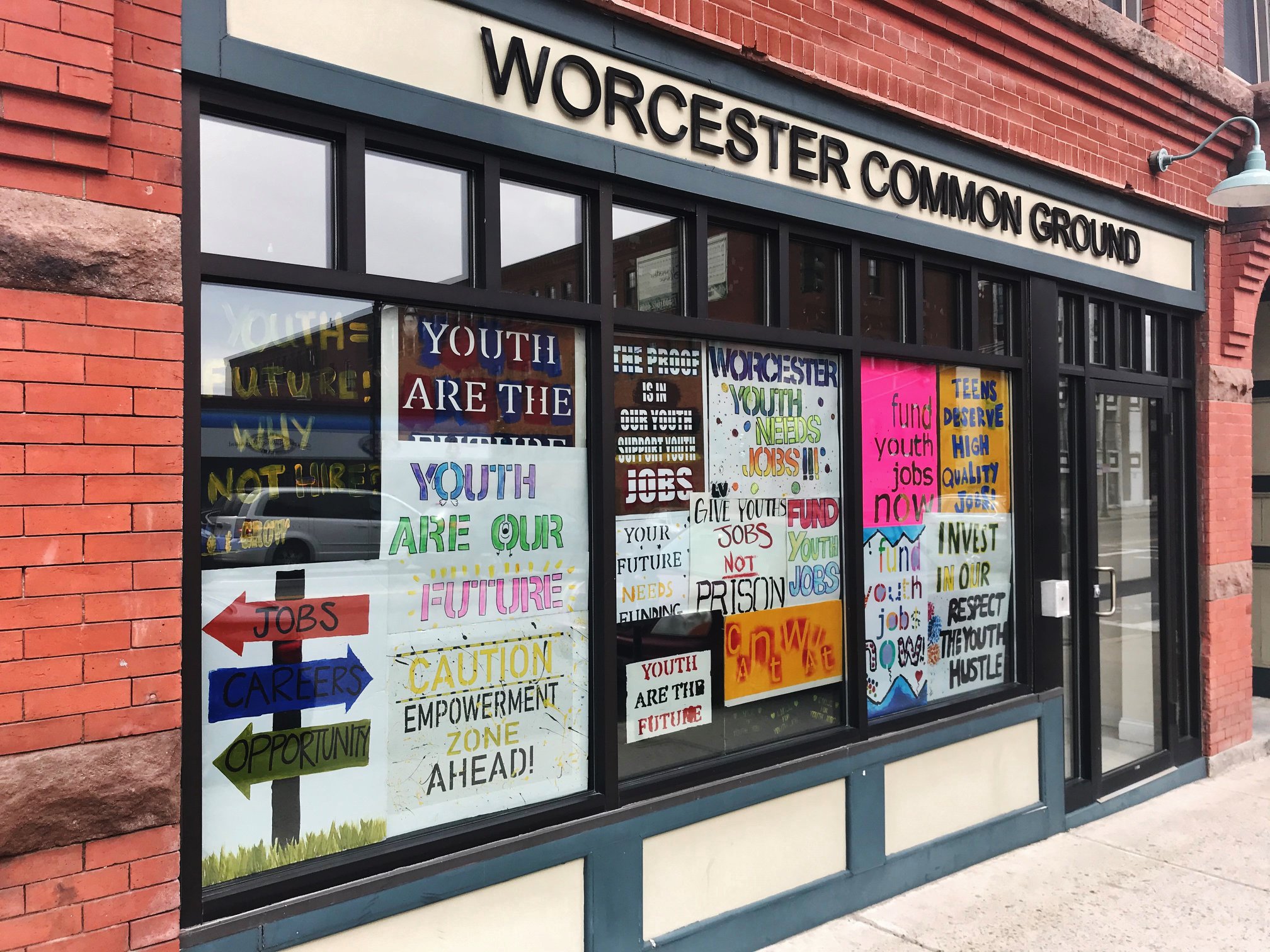Read more about the article Youth Job Rally Signs in our 133 Chandler Street Store Front